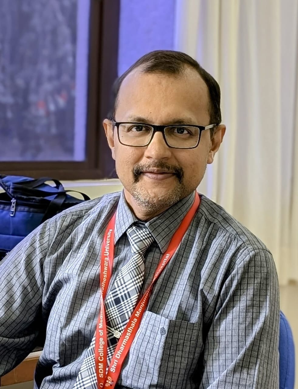 DR. KIRAN AITHAL